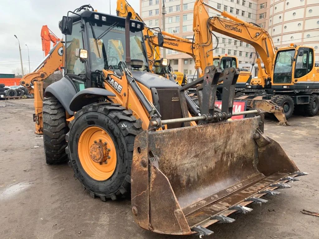 Экскаватор-погрузчик Case с молотом 3 ep sase 695